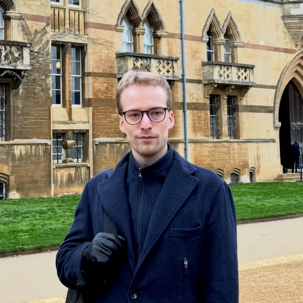Simon Foldvik in front of Christ Church Meadow building, Oxford